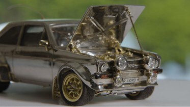 Tiny Classic Ford Escort Made of Gold, Diamonds and Silve...