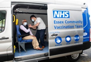 The first vaccines administered from the back of the mobi...